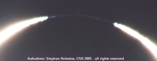 Sonnenfinsternis in Nebelwolken